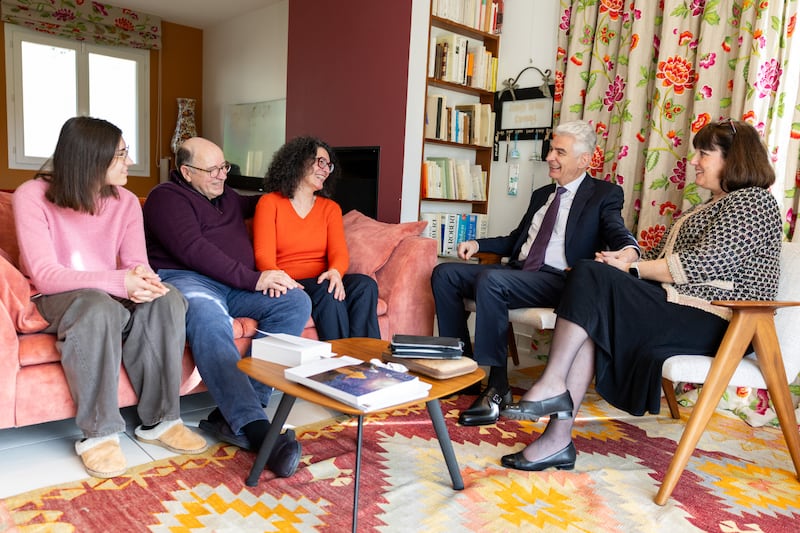 Elder Gérald Caussé of the Quorum of the Twelve Apostles and his wife, Valérie, speak with the Pelous family in Paris, France, on Saturday, Feb. 21, 2026. Elder Caussé ministered to Sylvian Pelous for many years while serving as a local leader in Paris more than 20 years ago.