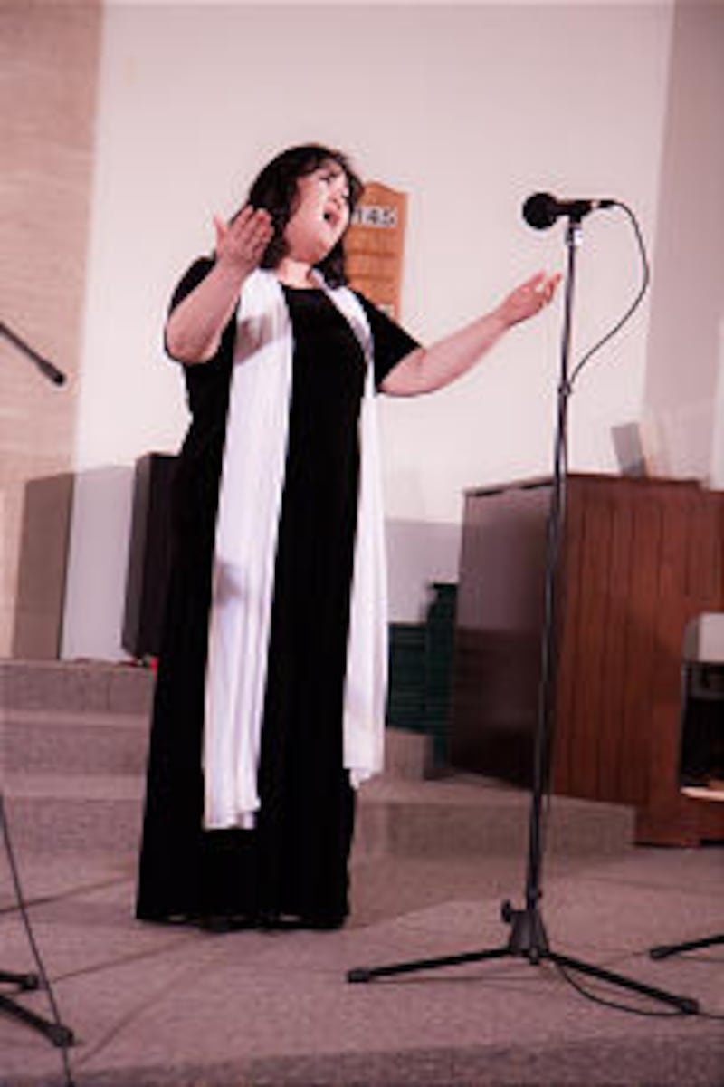 Soprano AhNesSa Lee performs at the 50th anniversary celebration of the Korea Mission, Nov. 18.