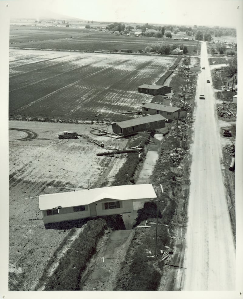 An aerial photo shows a row of homes torn from their foundations following the collapse of the Teton Dam on Saturday, June 5, 1976.