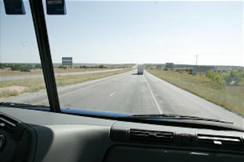 Open road stretches ahead near Muleshoe, Texas. Drivers often discuss shortcuts, but are cautious ab