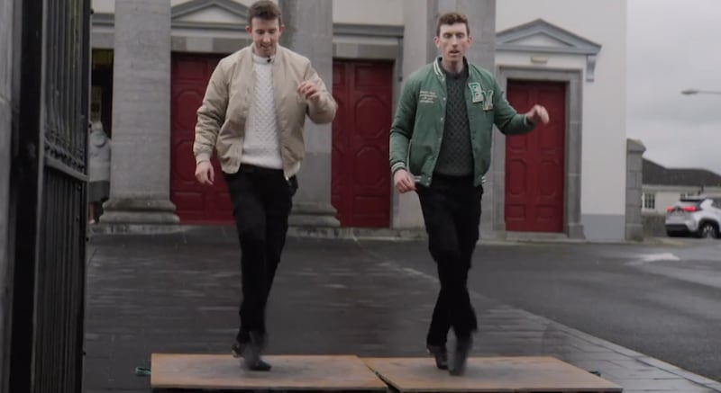 Michael and Matthew Gardiner do an Irish dance during their RootsTech virtual keynote address in February 2026.