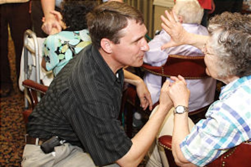 After performing at a health-care residence in Des Moines, Tabernacle Choir members, like Devin Asay