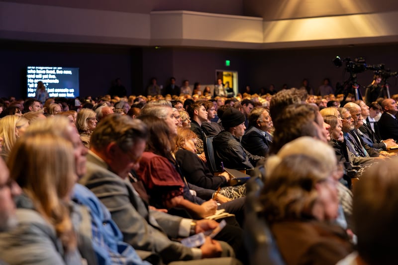 Audience members listen as Elder Dale G. Renlund of the Quorum of the Twelve Apostles speaks at the Neal A. Maxwell Institute for Religious Scholarship at Brigham Young University in Provo, Utah, on Tuesday, Oct. 13, 2026.