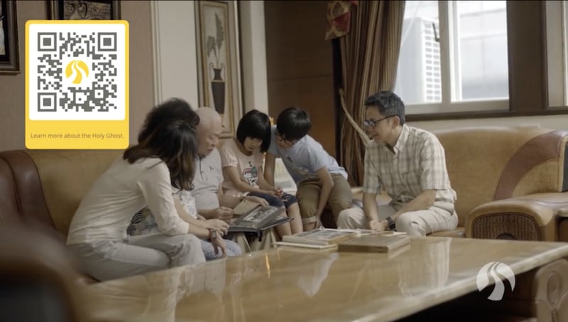 A QR code is displayed during BYU-Pathway Worldwide devotional on April 26, 2022, linking to President Brian K. Ashton’s personal list of scriptures that help him understand how God speaks to him.