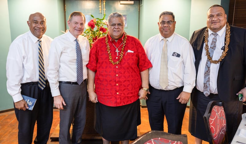 Elder Taniela Wakolo, a General Authority Seventy, and Elder Gary E. Stevenson of the Quorum of the Twelve Apostles, left, meet with the Laaulialemalietoa Polataivao Fosi Schmidt, the prime minister of the Independent State of Samoa, in Apia, Samoa, on May 22, 2026.