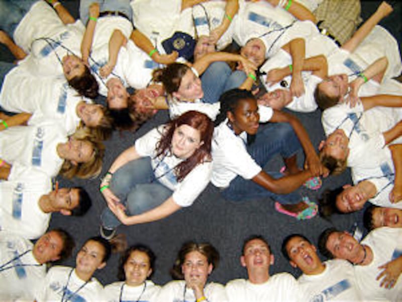 EFY participants are all smiles during a session activity. Youth are able to enjoy positive developm
