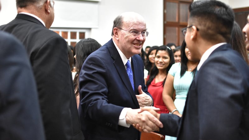 Elder Quentin L. Cook of the Quorum of the Apostles, center, greets priesthood leaders in Tegucigalpa, Honduras, in February 2023.