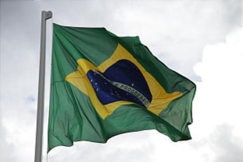Brazil's flag flies prominently in front of the Manaus Brazil Temple in the Amazon River Basin.