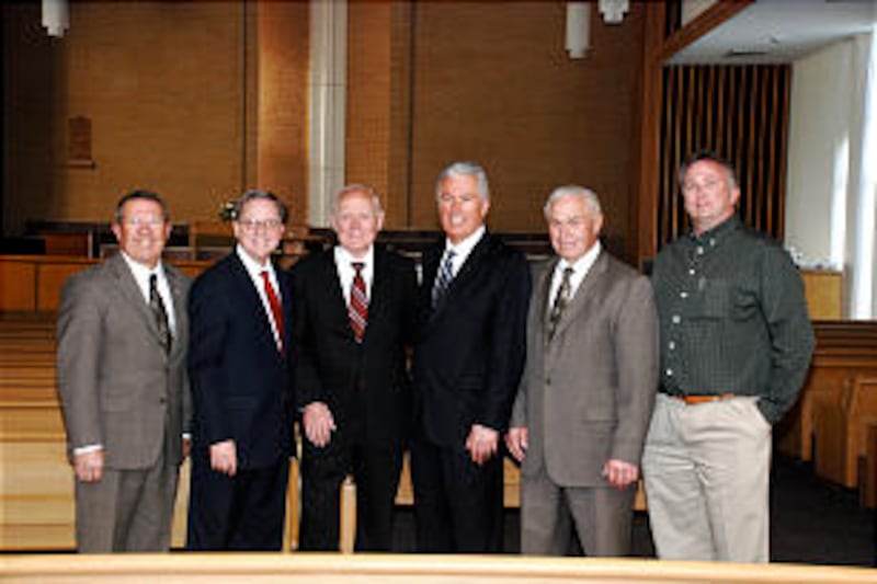 On day before dedication, Pres. Uchtdorf, fourth from left, visits with Blaine Bushman, left, Jerry