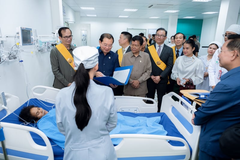 Cambodia Health Chheang Ra checks patient information at the new heart center at the Siem Reap Provincial Referral Hospital.