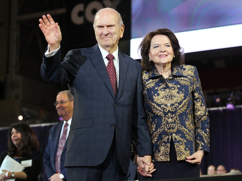 President Russell M. Nelson of The Church of Jesus Christ of Latter-day Saints waves to attendees with his wife Wendy after a devotional at the State Farm Stadium in Phoenix on Sunday, Feb. 10, 2019.
