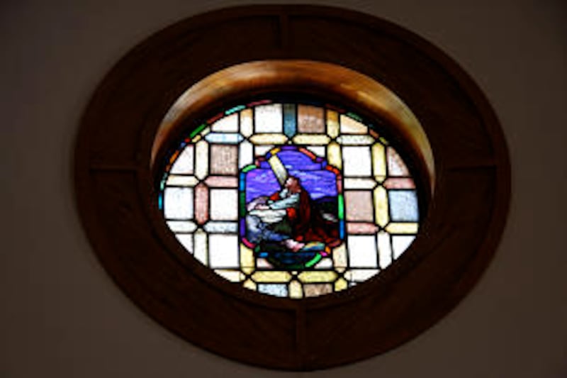 Stained glass windows are prominent part of Fort Lowell meetinghouse, constructed in Tucson, Ariz.,