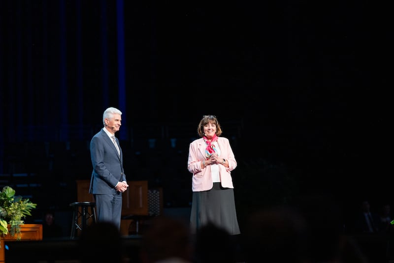 Elder Gérald Caussé of the Quorum of the Twelve Apostles, left, and his wife, Sister Valérie Caussé, right, give a devotional at BYU–Idaho on Sunday, June 14, 2026.
