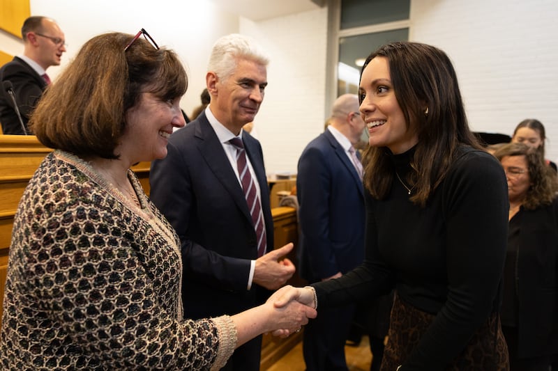 Elder Gérald Caussé of the Quorum of the Twelve Apostles and his wife, Valérie, visit with Cécile Alves de Freitas, who was baptized in July 2025 following a devotional held in Paris, France, on Saturday, Feb. 21, 2026.