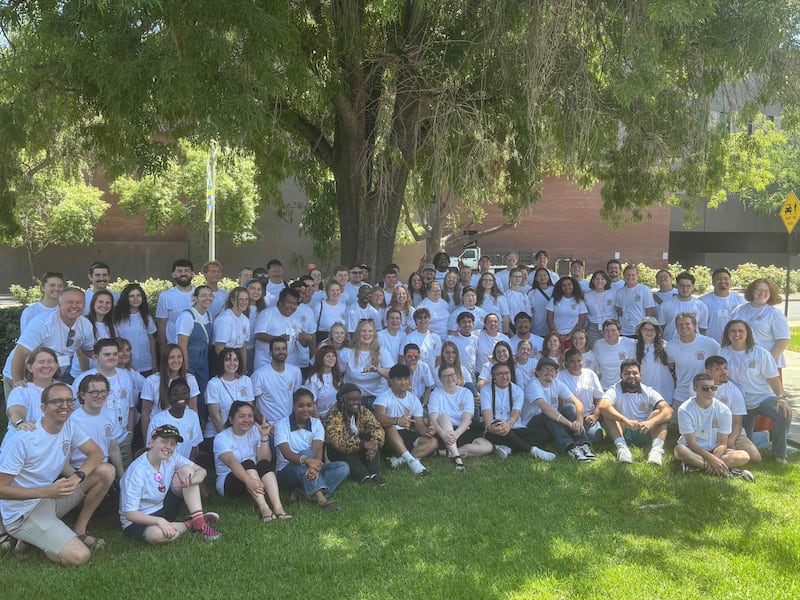 Young single adults pose for a photo at the 2025 ASL YSA conference in Riverside, California. The conference took place from Aug. 14 to 18, 2025.