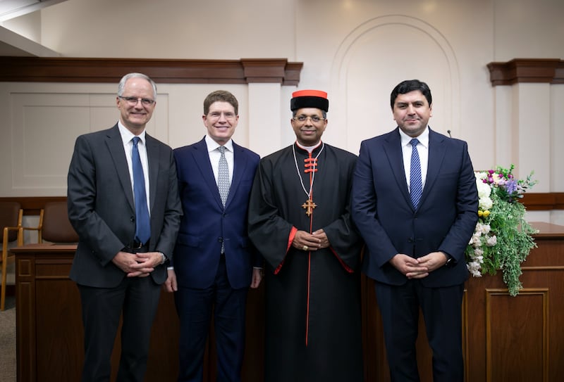 Members of the Church's South America South Area presidency, including left, Elder Mathias Held, Elder Alan R. Walker, and right, Elder Sergio R. Vargas, stand with Cardinal George Jacob Koovakad, prefect of the Dicastery for Interreligious Dialogue, at an interfaith event in Buenos Aires, Argentina, on Sept. 10, 2026.