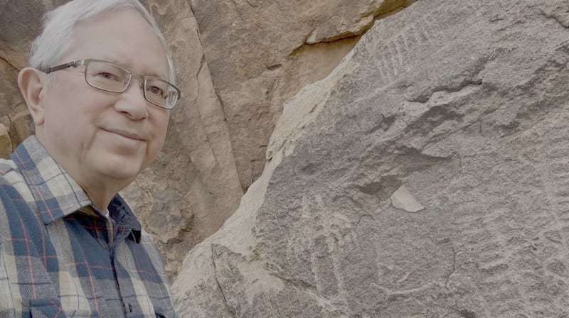 Elder Gerrit W. Gong stands next to petroglyphs in the Parowan Gap in Southern Utah in this undated photo used in a video published by the Church on Sunday, June 7, 2026.