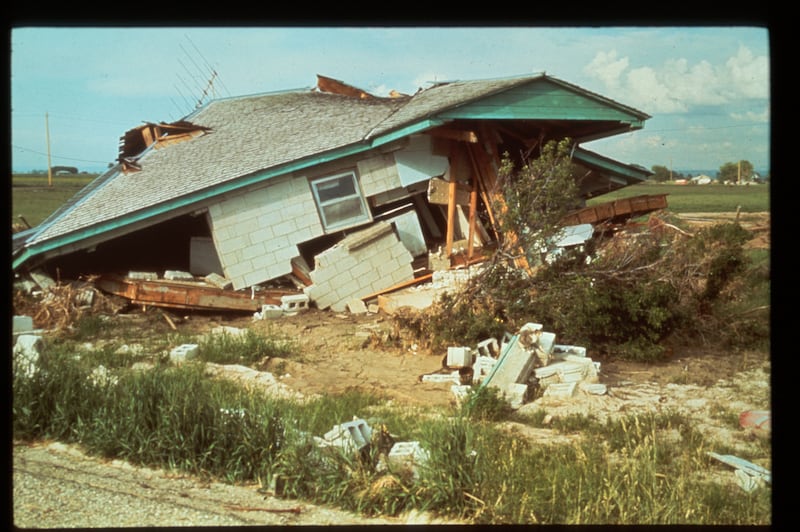 A house crumbles following flooding caused by the collapse of the Teton Dam on Saturday, June 5, 1976.