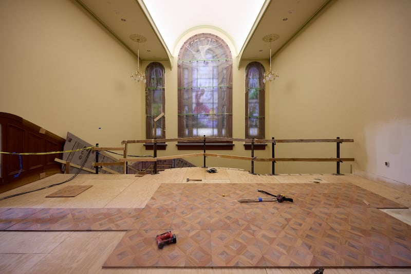 Staircase railing work is underway in a temple entrance building on Temple Square on Tuesday, April 21, 2026, in Salt Lake City.