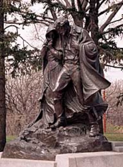 "Tragedy at Winter Quarters" by Avard Fairbanks is a prominent feature at the Mormon Pioneer Cemetery in Nebraska.
