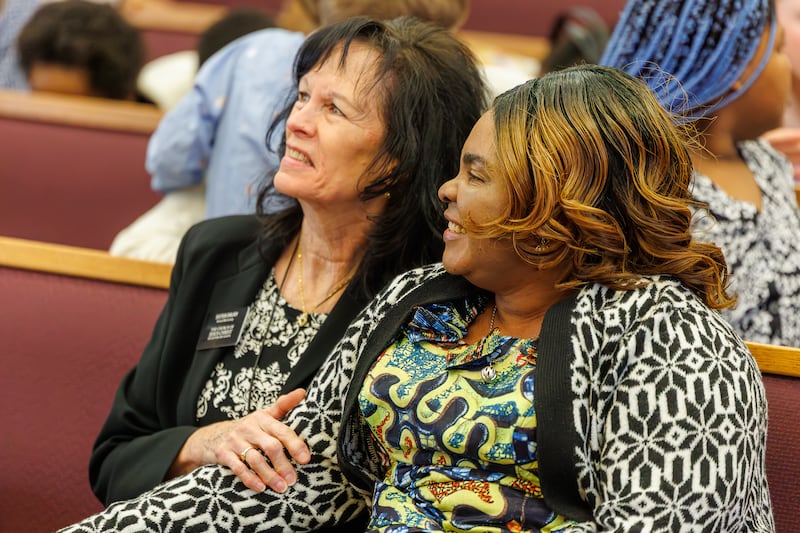 Esther Akulu sits with a friend during the creation of the Treasure Valley Ward (Swahili) in the Boise Idaho Stake on Sunday, Feb. 8, 2026.