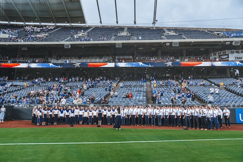 150 missionaries in the Missouri Independence Mission sing the national anthem before the Kansas City Royals game on Thursday, April 9, 2026.