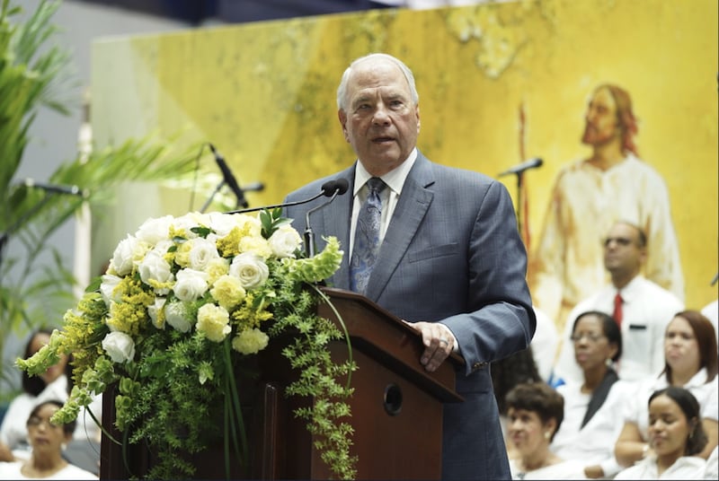 Elder Ronald A. Rasband of the Quorum of the Twelve Apostles speaks at a special conference in the Dominican Republic on April 25, 2026.