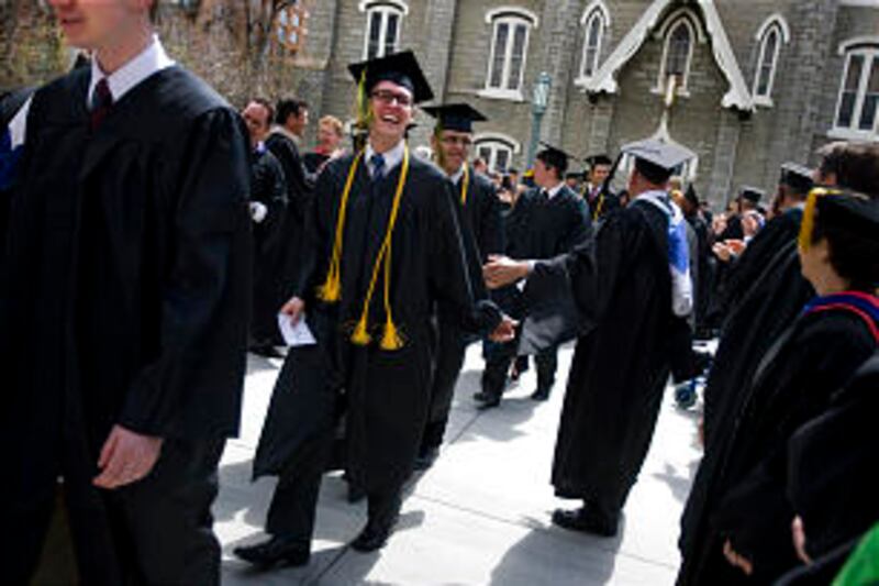 LDS Business College Class of 2011 walk in a procession through Temple Square into the Tabernacle on