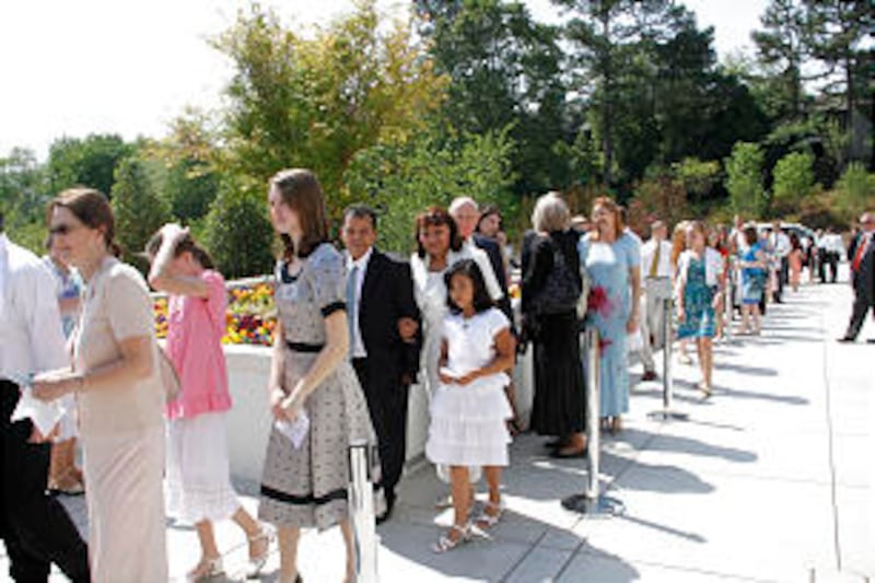 Members line up for the rededication. The temple was originally dedicated in 1983 by President Gordo