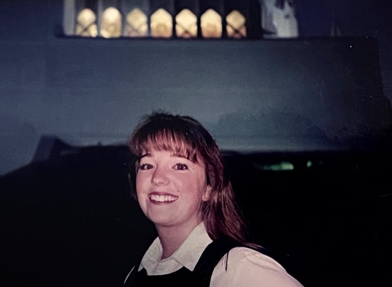 Kary Ann Hoopes smiles for a photo outside the San Diego California Temple on the exact spot where she felt she wanted to return to the house of the Lord after an open house tour in 1993. Hoopes was baptized into The Church of Jesus Christ of Latter-day Saints a few months later.