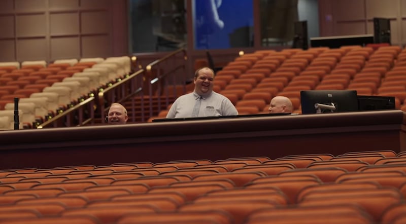 Audio engineers prepare for general conference in the Conference Center.