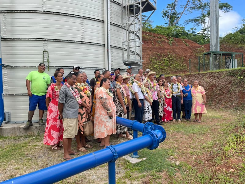 Latter-day Saints and community members in Taha’a, French Polynesia, on Oct. 6, 2026, pose next to new water tanks made possible on the island thanks to donations from The Church of Jesus Christ of Latter-day Saints.