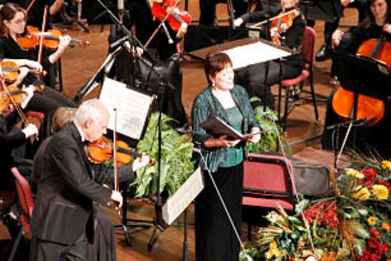 Mezzo-soprano Laura Garff Lewis is accompanied by maestro Igor Gruppman on the violin during a conce