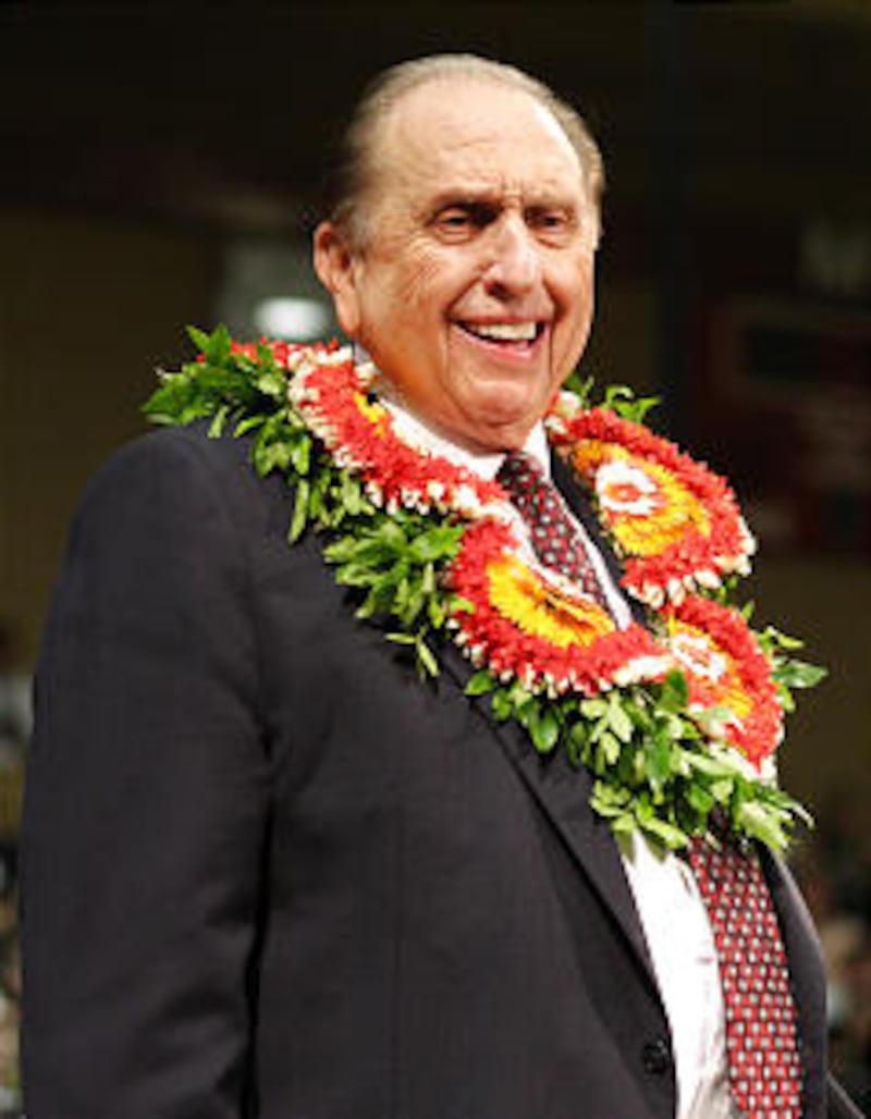 President Thomas S. Monson smiles at more than 2,000 youth gathered in the Cannon Activities Center