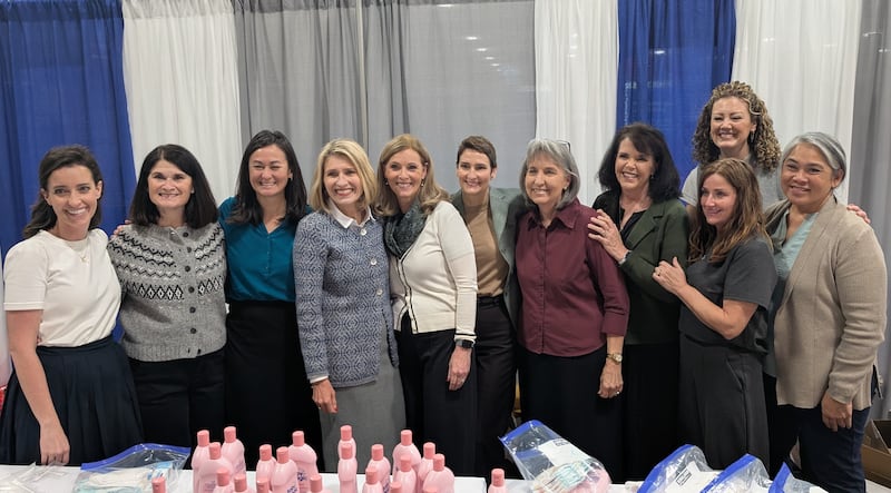 Members of the Relief Society general advisory council join the Relief Society general presidency to pose for a photo at a JustServe project at the National League of Cities summit in Salt Lake City on Thursday, Nov. 20, 2025. From left to right: Sister Hannah Miller; Sister Dana Earl; Sister Kristin M. Yee, second counselor; Relief Society General President Camille N. Johnson; Sister Sandra Singer; Sister Carolee Scowcroft; Sister J. Anette Dennis; Sister Sharlene Miner; Sister Andrea McConkie; Sister Elaine Thornton and Sister Mitzi Semo.