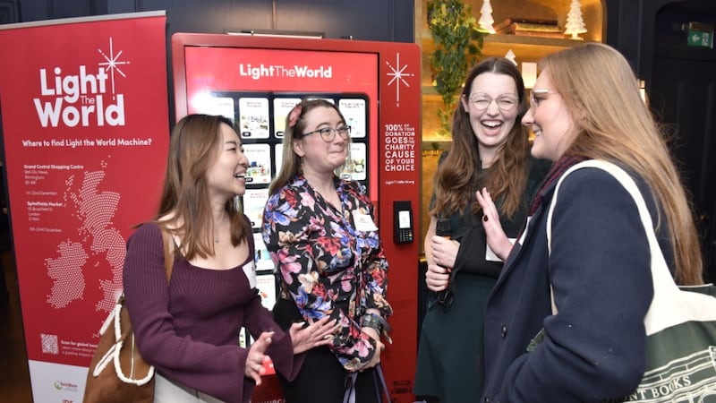 People gather in Westminster, London, England, to meet with the charities featured in this year’s Light the World Machine initiative on Nov 26, 2025.