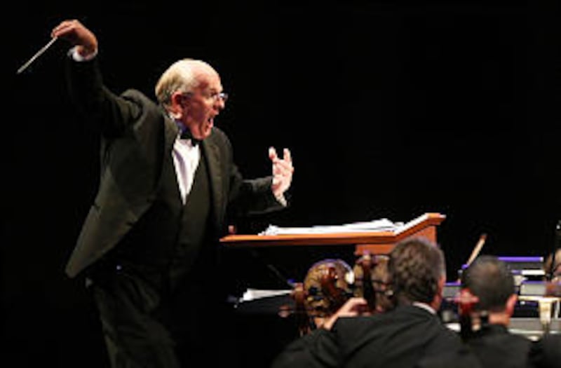 Mack Wilberg, above, and Ryan Murphy, below, conduct the Mormon Tabernacle Choir and Orchestra at Te