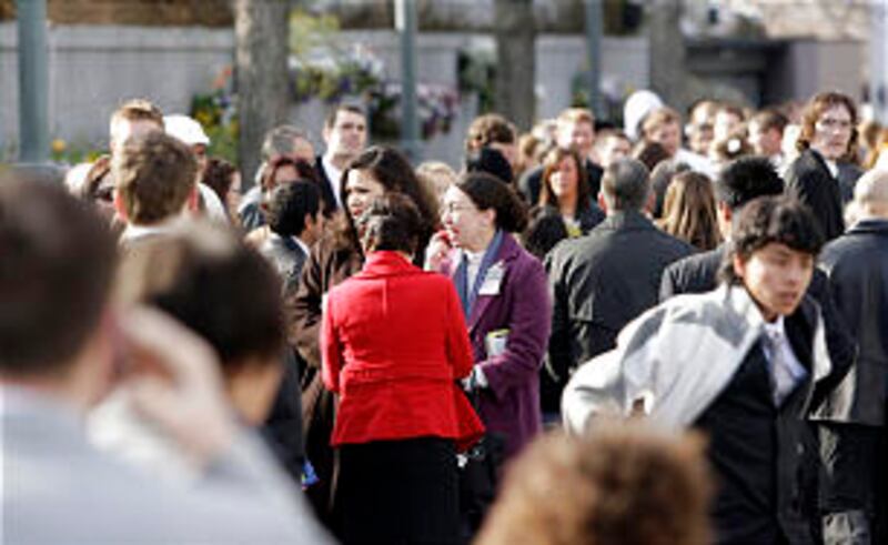 Pleasant temperatures and moments of sunshine add to the beauty of the day as many wait in line for