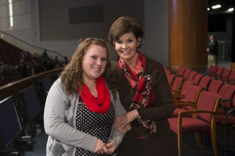 Sister Kristen M. Oaks greets students after devotional.