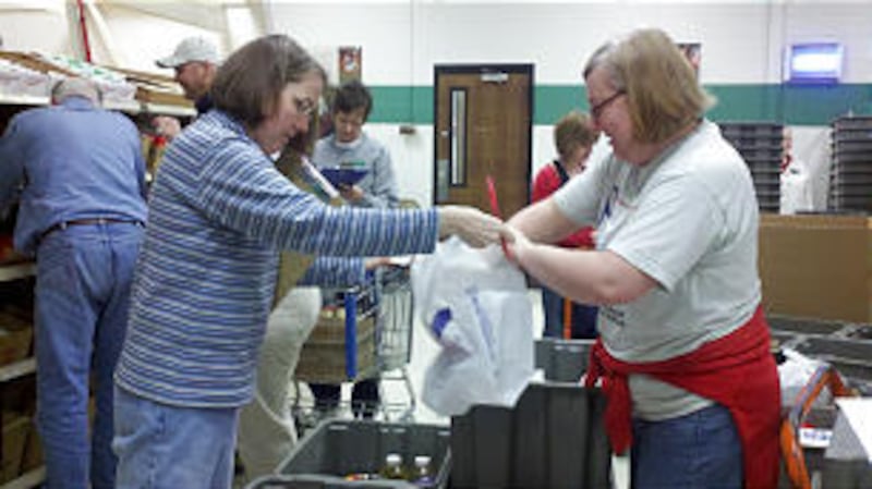 Single adults from the Atlanta Georgia Stake work together in the cannery.