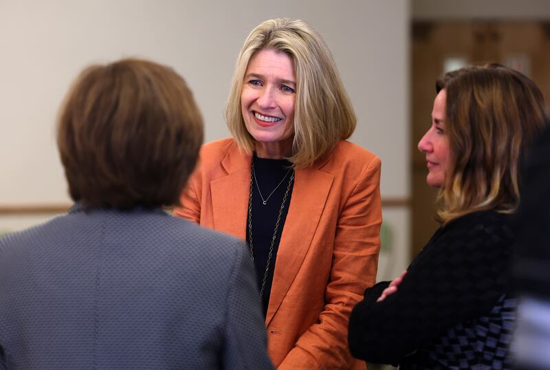 Relief Society General President Camille N. Johnson interacts with attendees before speaking to the Brigham Young University J. Reuben Clark Law Society.
