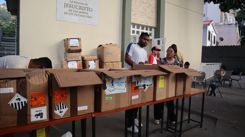 Volunteers and missionaries from The Church of Jesus Christ of Latter-day Saints prepare supplies for those affected by twin earthquakes in Venezuela, Saturday, June 27, 2026.