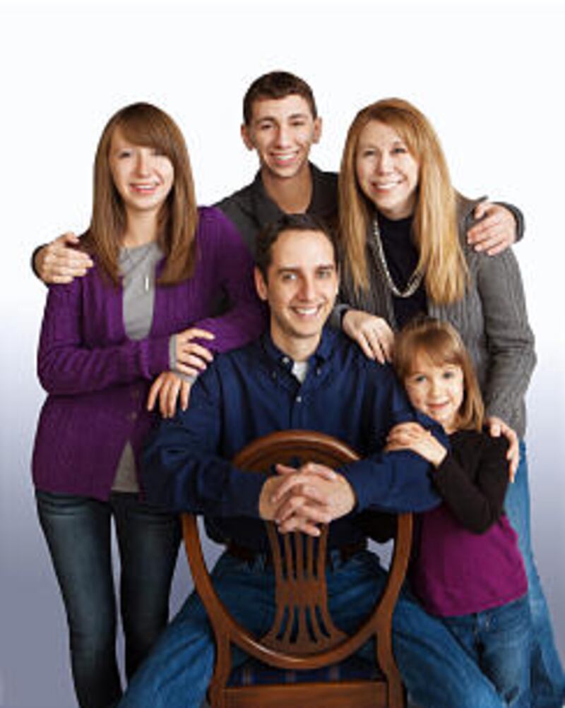 Tamara Passey, 2013 Arizona Young Mother of the Year, and her husband, Steven, have three children â