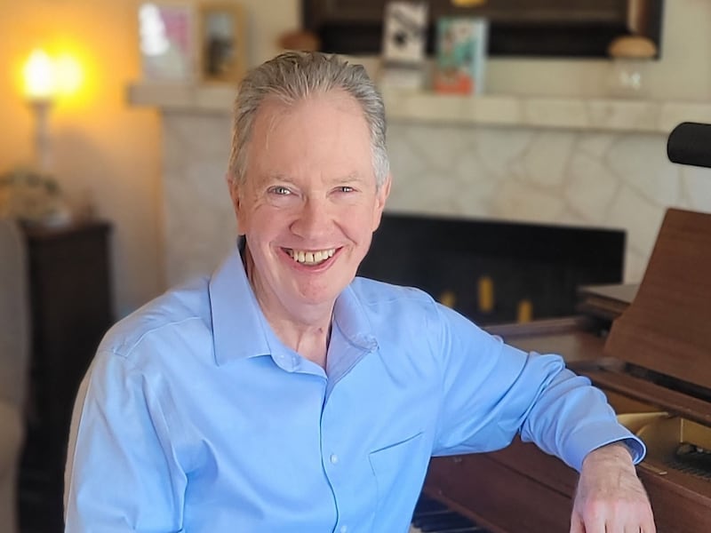 Songwriter Alan L. Patterson poses for a picture at his piano in his home in Bountiful, Utah, May 19, 2026.