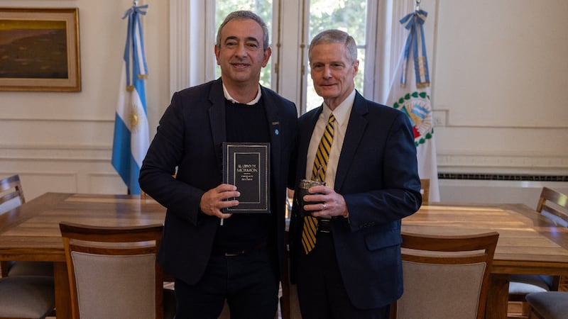 Elder David A. Bednar of the Quorum of the Twelve Apostles, right, poses for a photo with Mayor Pablo Javkin at the Municipal Palace in Rosario, Argentina, on May 20, 2026.
