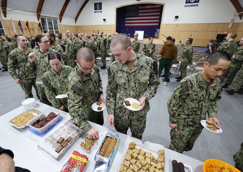 U.S. Naval officer candidates line up for treats after the Sailors’ Devotional in Newport, Rhode Island.