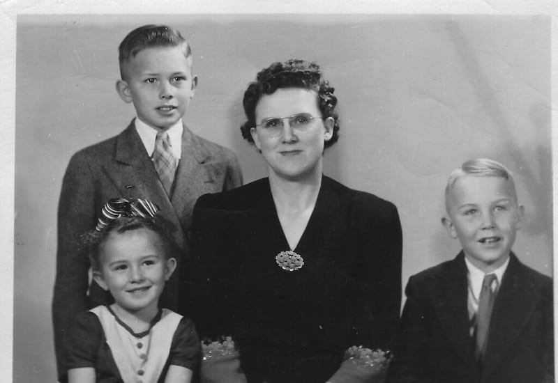 President Dallin H. Oaks with his mother, Stella, brother Merrill and sister Evelyn. President Oaks’ father died when he was 7 years old, and his mother raised three children on her own.