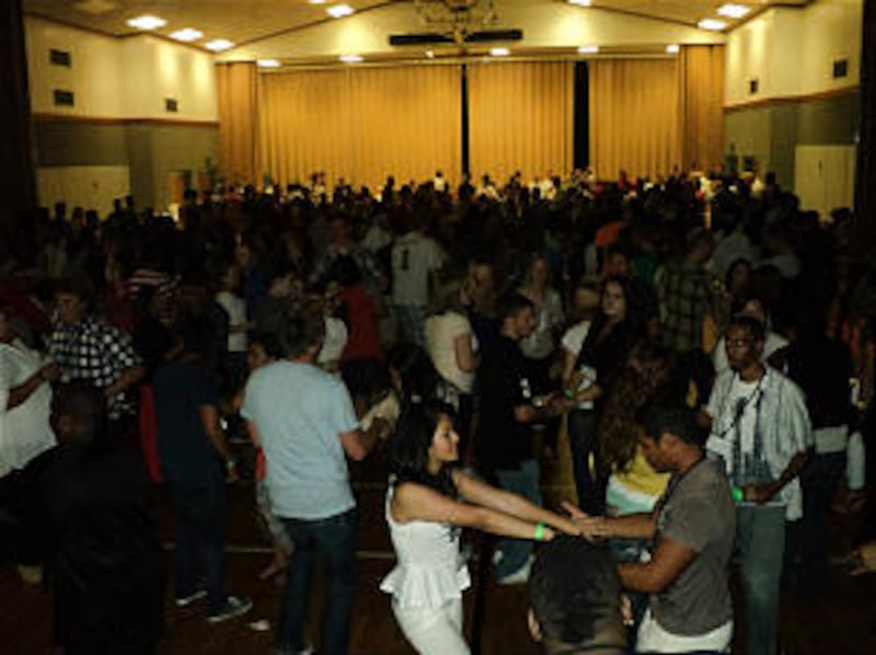 Hundreds of young single adults gather in the Orlando Florida South Stake Center during a regional c