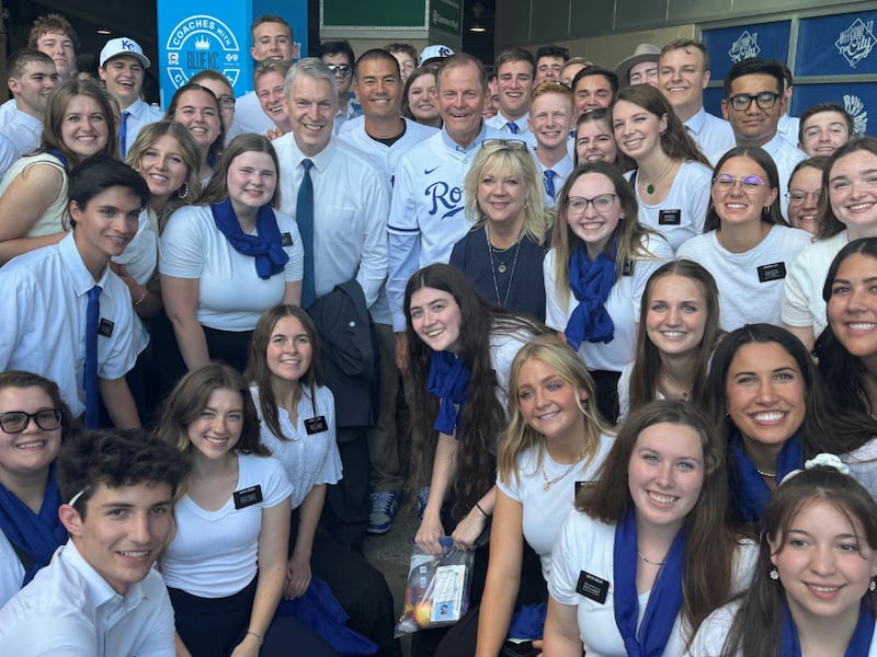 Elder Gary E. Stevenson of the Quorum of the Twelve Apostles and his wife, Sister Lesa Stevenson, are pictured with some of the 150 missionaries from the Church's Missouri Independence Mission. The missionaries sang the United States national anthem, and Elder Stevenson threw the ceremonial first pitch at a Kansas City Royals baseball game on Tuesday, August 6, 2024.