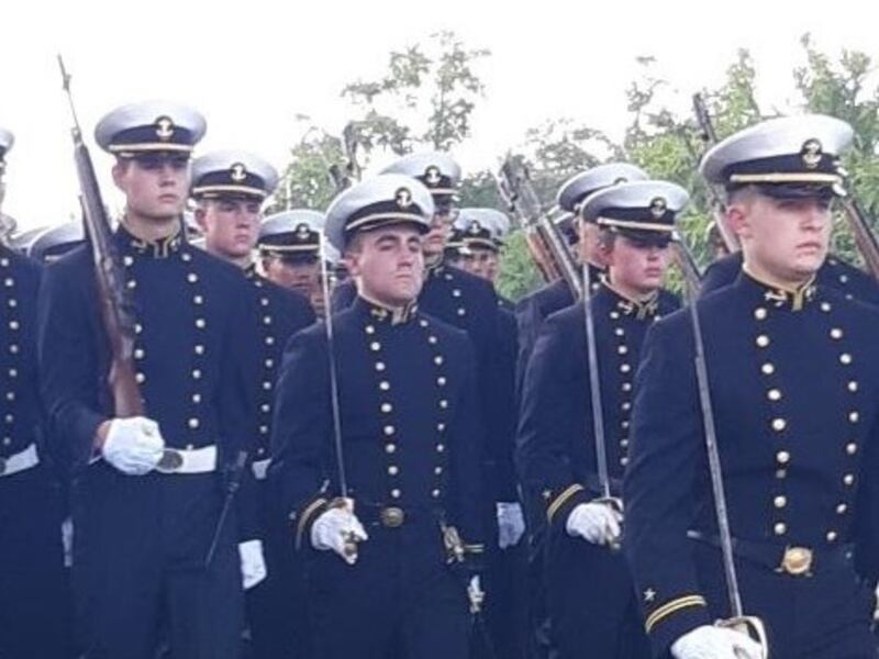 U.S. Navy Midshipman 1st Class Christian Swensen, middle second row, marches during dress parade on Sept. 3, 2021, at the United States Naval Academy in Annapolis, Maryland.